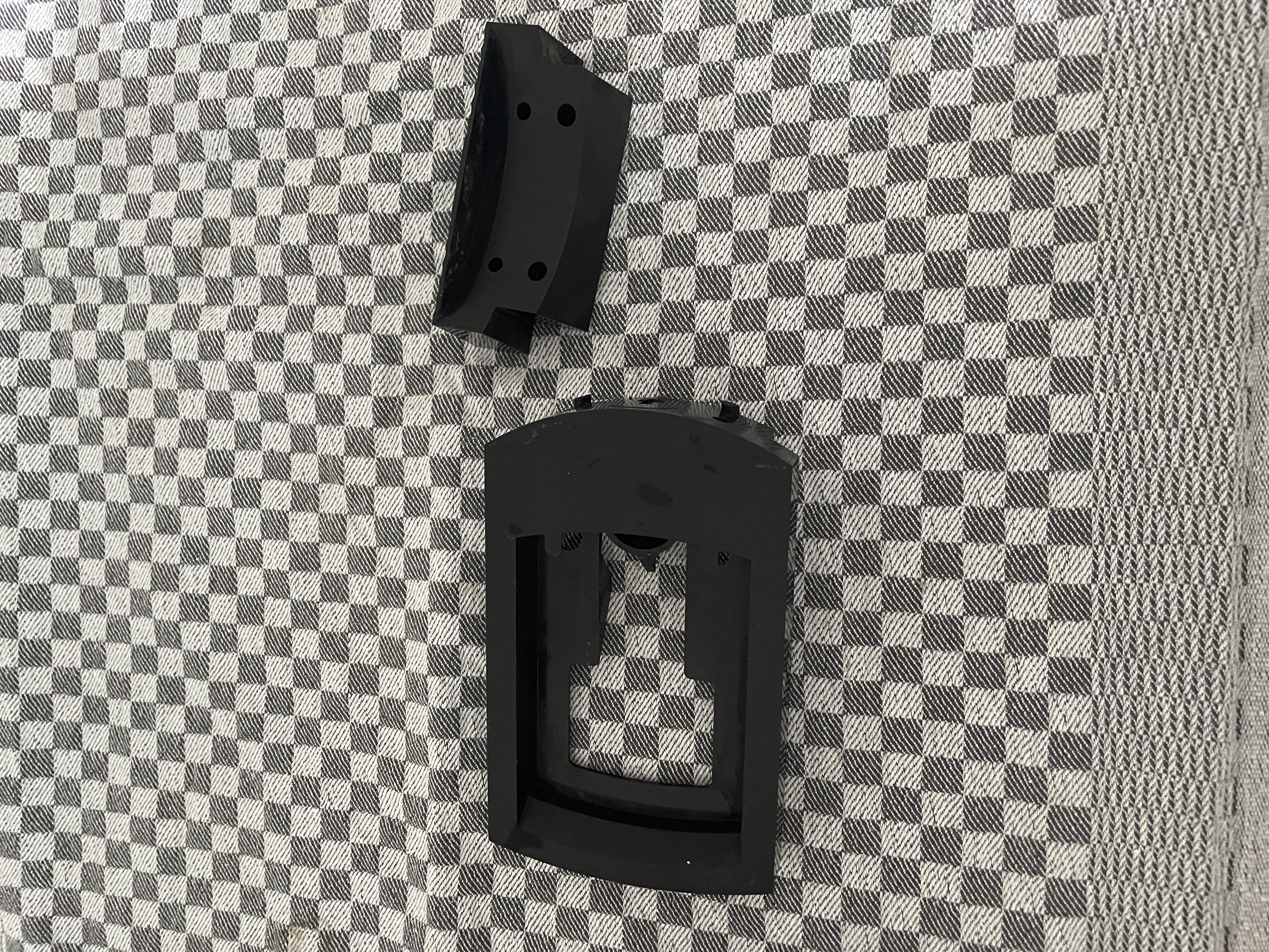 Two parts of the holder